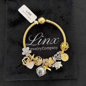 Linx Yellow Gold Bracelet with Religious Mom Themed Charms